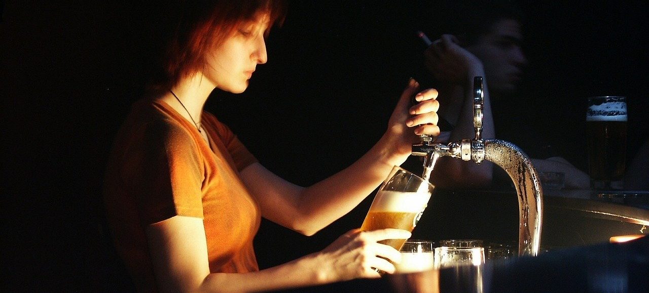 woman serving beer